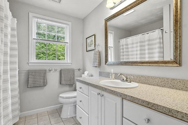 155 Burlington St, Woburn, MA 01801 - full bathroom featuring baseboards, vanity, toilet, and tile patterned floors