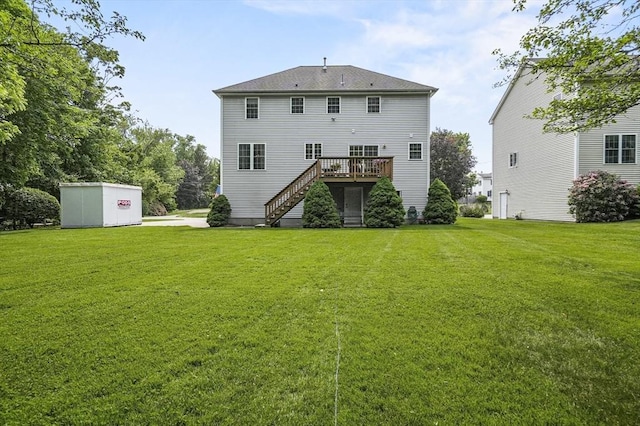 155 Burlington St, Woburn, MA 01801 - rear view of house with stairs, a deck, and a yard