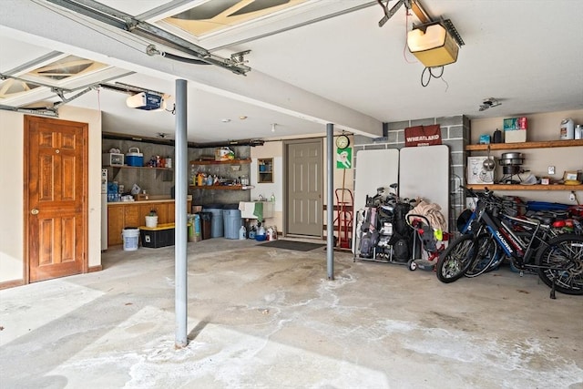 garage featuring a garage door opener