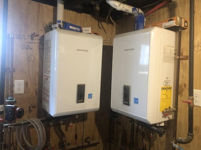 utility room with tankless water heater