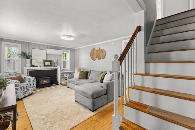 31 Webster St, Randolph, MA 02368 - living area featuring ornamental molding, stairs, plenty of natural light, and light wood-style flooring