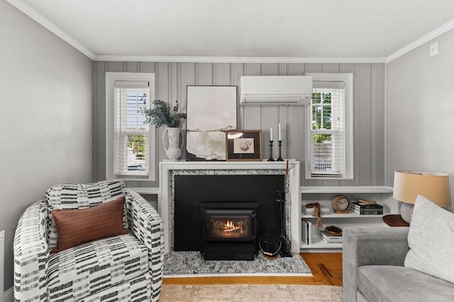 31 Webster St, Randolph, MA 02368 - living room with a wall mounted air conditioner, crown molding, wood finished floors, and a lit fireplace