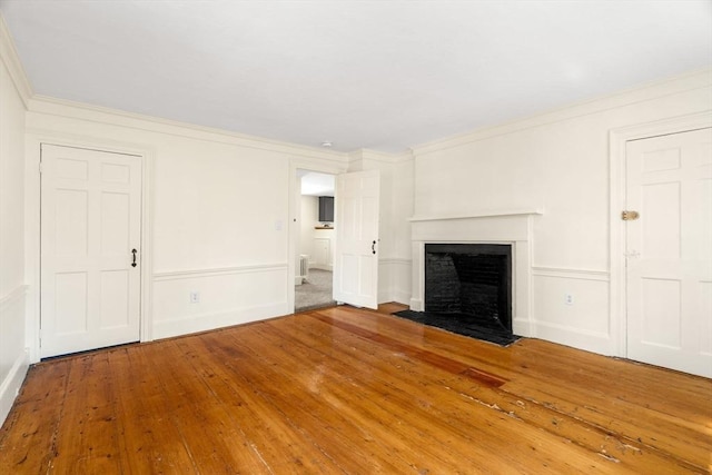 6 River St, Salem, MA 01970 - unfurnished living room with wood-type flooring, a fireplace with flush hearth, and ornamental molding