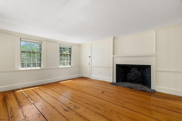 6 River St, Salem, MA 01970 - unfurnished living room featuring hardwood / wood-style floors and a fireplace with raised hearth