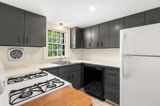 6 River St, Salem, MA 01970 - kitchen featuring freestanding refrigerator, dishwasher, dark cabinets, light countertops, and recessed lighting