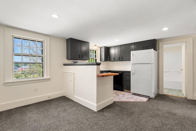 6 River St, Salem, MA 01970 - kitchen featuring freestanding refrigerator, dishwasher, dark cabinets, light colored carpet, and recessed lighting