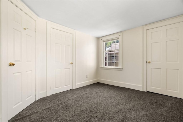 6 River St, Salem, MA 01970 - unfurnished bedroom with dark colored carpet and baseboards