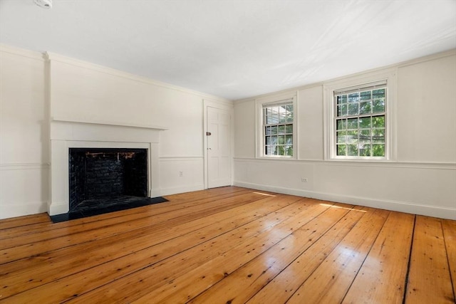 6 River St, Salem, MA 01970 - unfurnished living room with hardwood / wood-style floors and a fireplace with flush hearth