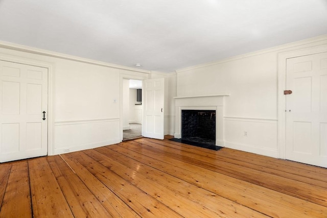 6 River St, Salem, MA 01970 - unfurnished living room with wood-type flooring, a fireplace with flush hearth, and ornamental molding