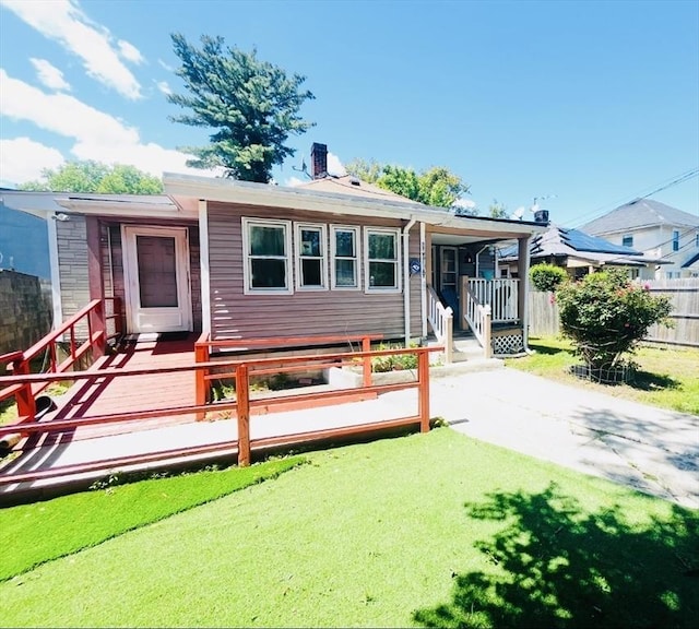 173 Brookway Rd, Boston, MA 02131 - rear view of property with a chimney