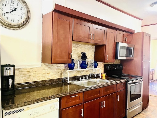 173 Brookway Rd, Boston, MA 02131 - kitchen with appliances with stainless steel finishes, a sink, backsplash, and dark stone counters