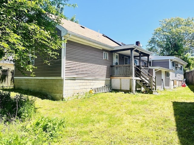 173 Brookway Rd, Boston, MA 02131 - back of house with stairs, a wooden deck, and a chimney