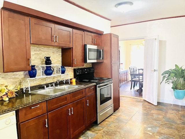 173 Brookway Rd, Boston, MA 02131 - kitchen with appliances with stainless steel finishes, backsplash, a sink, baseboards, and dark stone countertops
