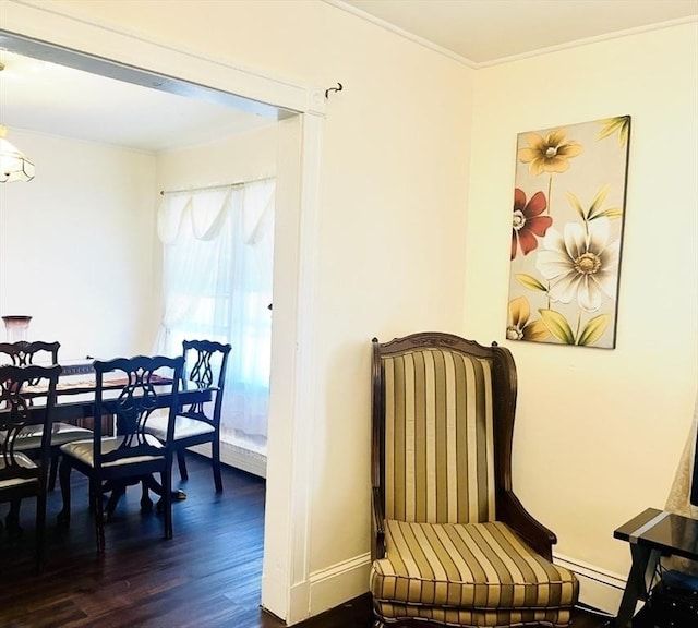 173 Brookway Rd, Boston, MA 02131 - dining space with dark wood finished floors, baseboards, ornamental molding, and a baseboard heating unit