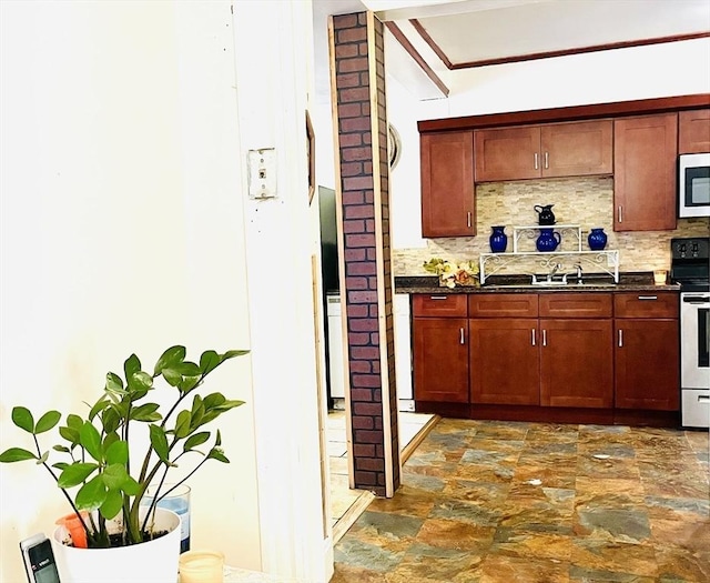 173 Brookway Rd, Boston, MA 02131 - kitchen with a sink, electric range oven, decorative backsplash, and dark stone finish floors