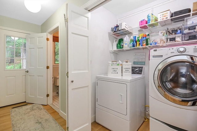 28 Smithshire Ests, Andover, MA 01810 - laundry room featuring independent washer and dryer and light wood-style flooring