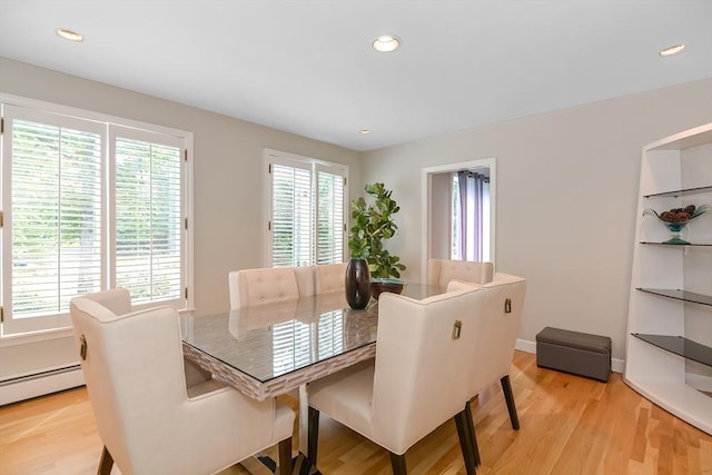 28 Smithshire Ests, Andover, MA 01810 - dining area featuring a baseboard heating unit, light wood finished floors, and recessed lighting