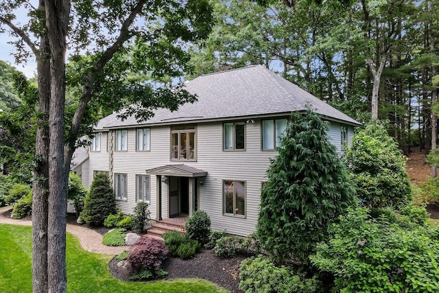 28 Smithshire Ests, Andover, MA 01810 - colonial inspired home featuring a shingled roof and a front lawn