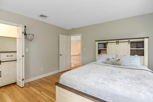 28 Smithshire Ests, Andover, MA 01810 - bedroom with light wood-style floors and baseboards