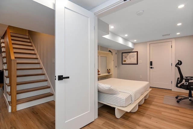 28 Smithshire Ests, Andover, MA 01810 - bedroom with light wood-style floors and recessed lighting