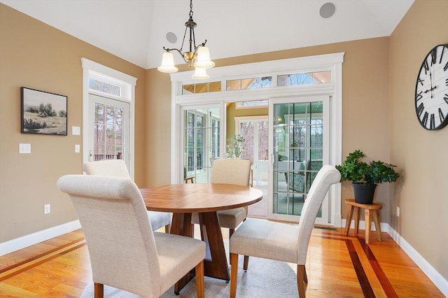 7 Buckhide Rd, Windham, NH 03087 - dining room with light wood finished floors, baseboards, a chandelier, and lofted ceiling
