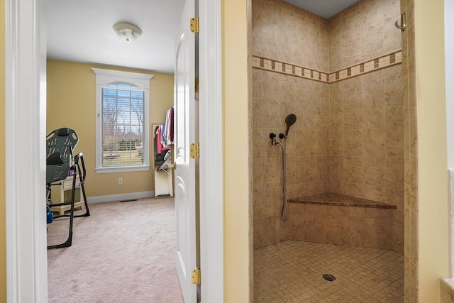 7 Buckhide Rd, Windham, NH 03087 - bathroom featuring a tile shower and baseboards