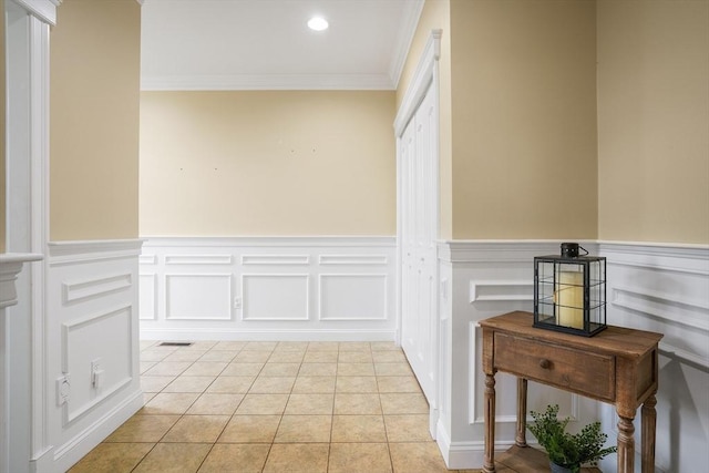 7 Buckhide Rd, Windham, NH 03087 - hall featuring ornamental molding, light tile patterned floors, a wainscoted wall, a decorative wall, and recessed lighting
