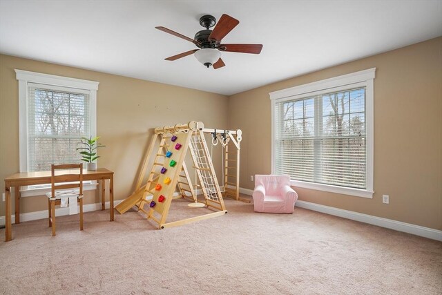 7 Buckhide Rd, Windham, NH 03087 - recreation room with plenty of natural light, ceiling fan, and baseboards