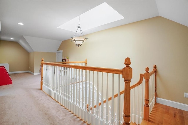 7 Buckhide Rd, Windham, NH 03087 - corridor featuring an upstairs landing, lofted ceiling, a skylight, baseboards, and recessed lighting