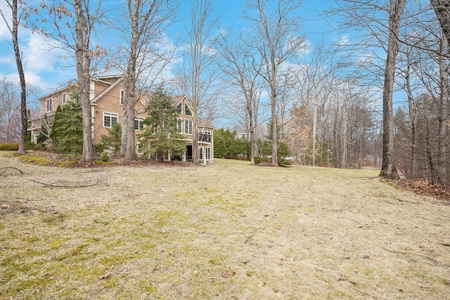 7 Buckhide Rd, Windham, NH 03087 - view of green lawn featuring a wooden deck