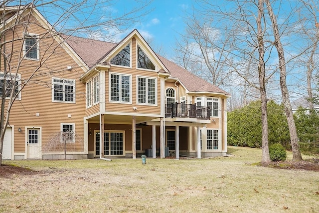 7 Buckhide Rd, Windham, NH 03087 - back of property with a yard and a deck