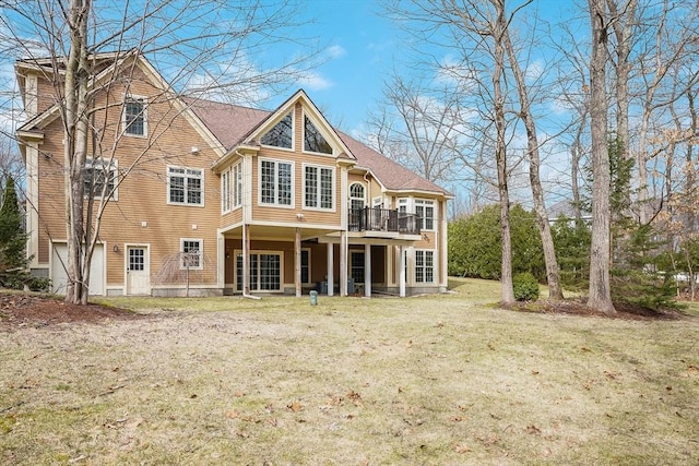 7 Buckhide Rd, Windham, NH 03087 - back of property with a yard, an attached garage, and a deck