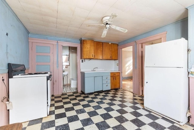 kitchen with ceiling fan, sink, and white appliances