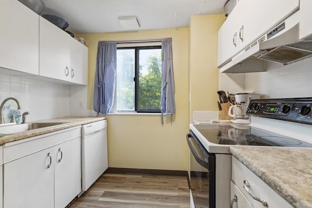 96 Old Colony Ave Unit 168, Taunton, MA 02718 - kitchen with electric range oven, white dishwasher, white cabinetry, under cabinet range hood, and backsplash