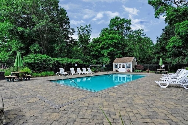 96 Old Colony Ave Unit 168, Taunton, MA 02718 - view of pool featuring a patio area and an outdoor structure