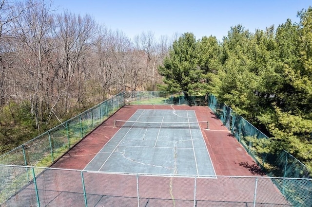 96 Old Colony Ave Unit 168, Taunton, MA 02718 - view of tennis court featuring a forest view