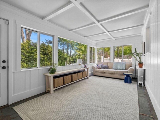 sunroom / solarium with coffered ceiling, beamed ceiling, and outdoor lounge area