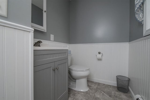 769 Federal St, Belchertown, MA 01007 - bathroom with a wainscoted wall, vanity, and a baseboard heating unit