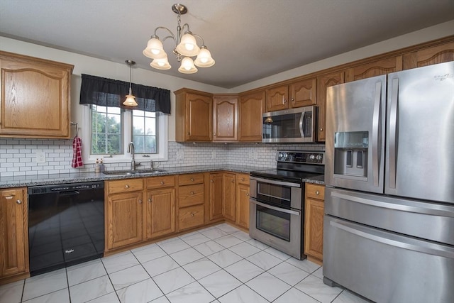 769 Federal St, Belchertown, MA 01007 - kitchen with appliances with stainless steel finishes, brown cabinetry, a chandelier, dark stone counters, and decorative backsplash