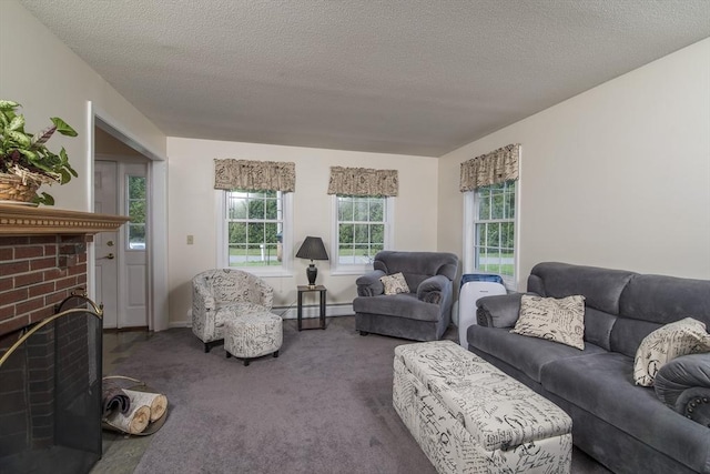 769 Federal St, Belchertown, MA 01007 - carpeted living area featuring a brick fireplace, a baseboard radiator, and a textured ceiling