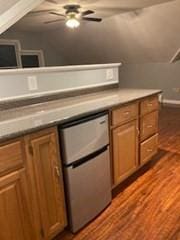 769 Federal St, Belchertown, MA 01007 - kitchen with dark wood finished floors, a ceiling fan, and brown cabinetry