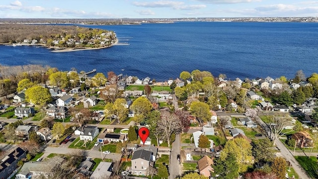 aerial view with a water view and a residential view