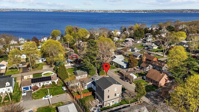 aerial view featuring a residential view and a water view