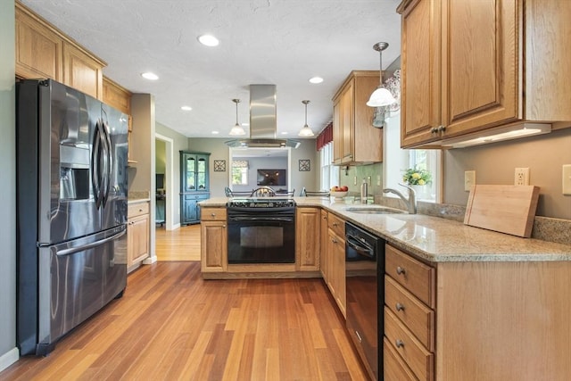 2 Harding Rd, Medway, MA 02053 - kitchen with black appliances, island exhaust hood, a peninsula, light wood finished floors, and decorative light fixtures