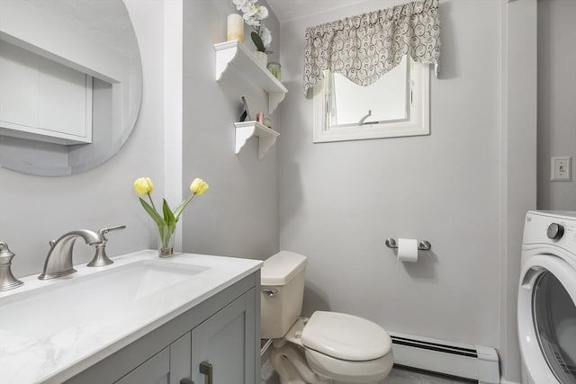 2 Harding Rd, Medway, MA 02053 - half bath featuring a baseboard radiator, washer / dryer, and vanity
