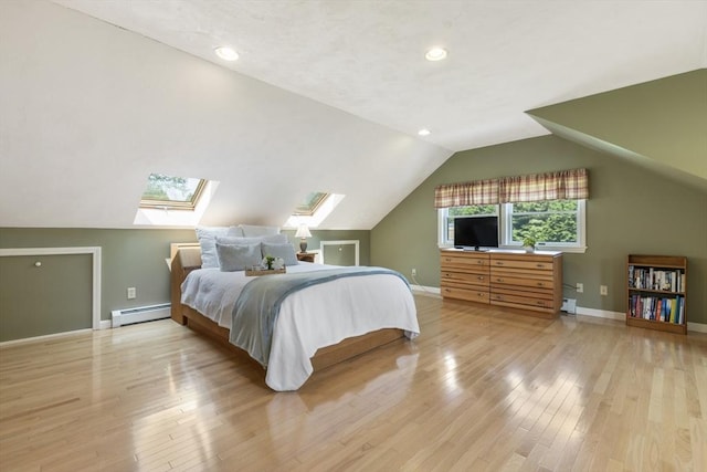 2 Harding Rd, Medway, MA 02053 - bedroom featuring a baseboard radiator, light wood-type flooring, a skylight, vaulted ceiling, and recessed lighting