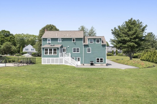 2 Harding Rd, Medway, MA 02053 - back of property featuring a patio and a chimney