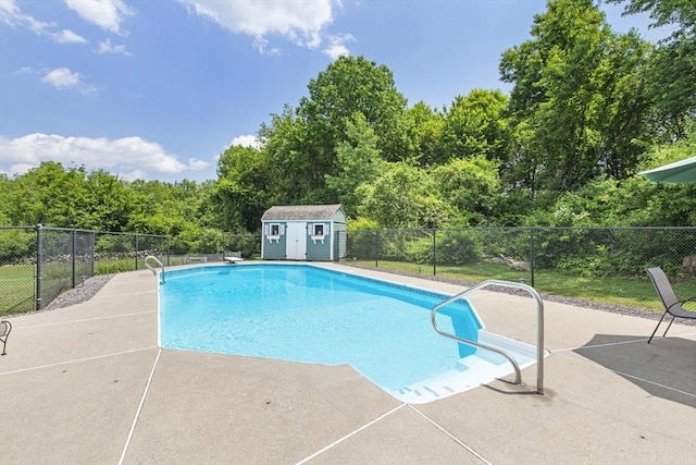 2 Harding Rd, Medway, MA 02053 - view of swimming pool featuring a patio area and a shed