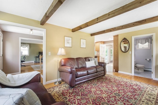 2 Harding Rd, Medway, MA 02053 - living room featuring light wood-style floors, beam ceiling, and a baseboard heating unit