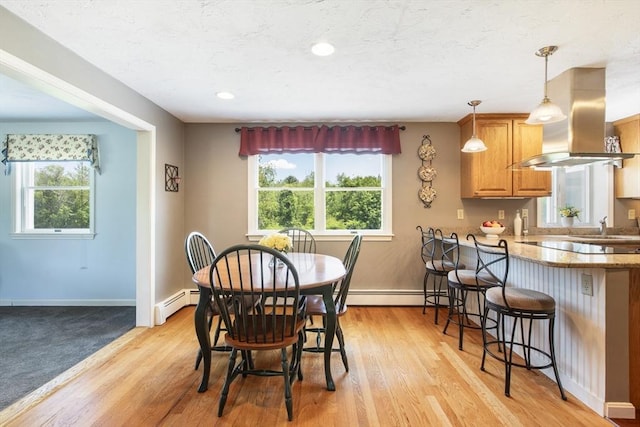 2 Harding Rd, Medway, MA 02053 - dining room with baseboard heating, healthy amount of natural light, light wood finished floors, and recessed lighting